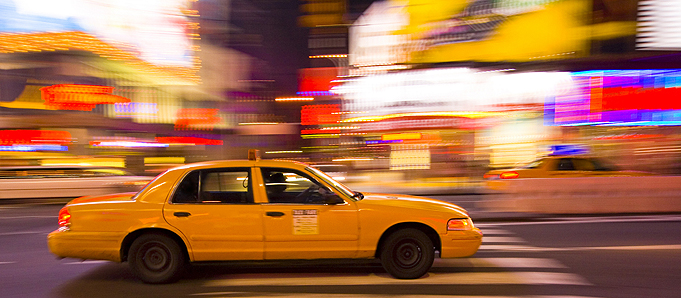 An image of a yellow New York taxi